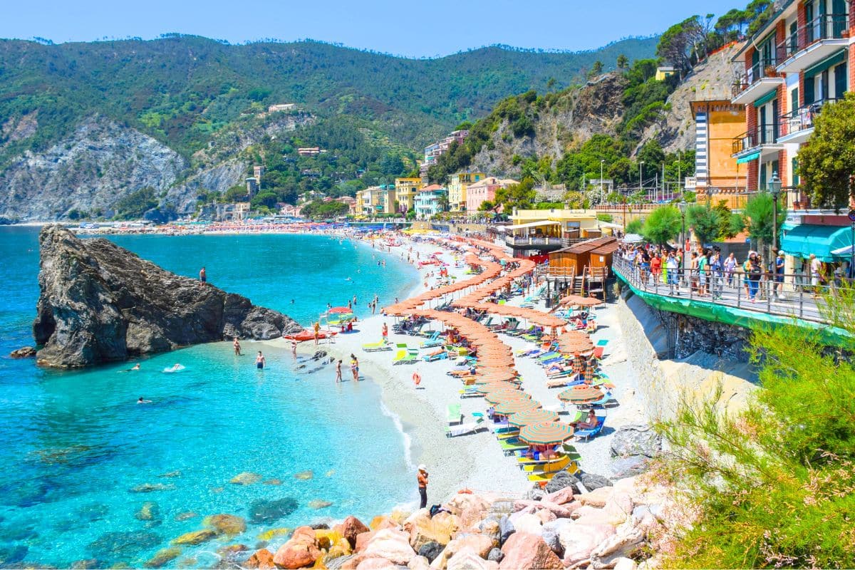 Turquoise sea against the white sands of Monterosso al Mare Italy