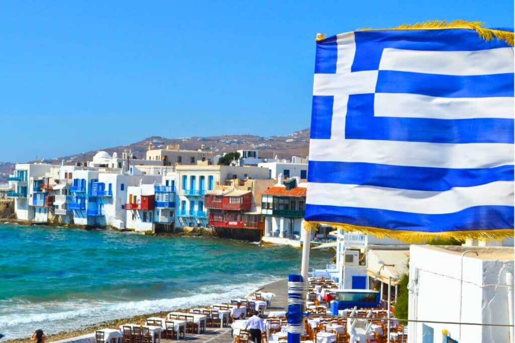 Greek Flag Over Little Venice Mykonos Greece