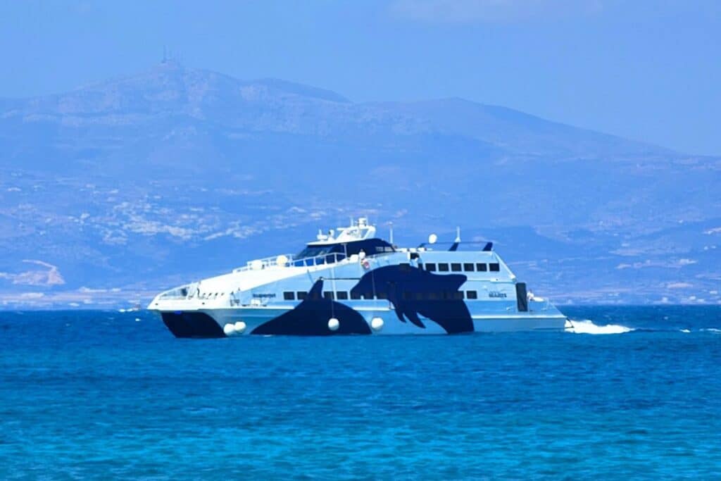 A seajets fast ferry cruises past Santorini in Greece